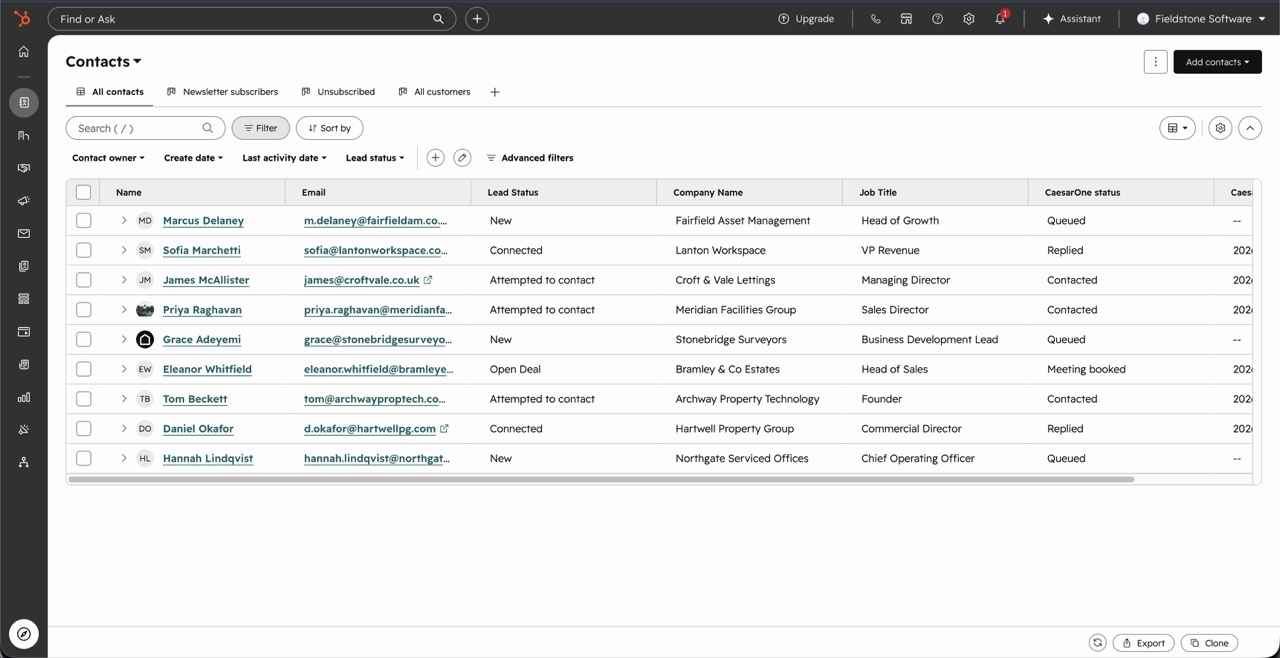 HubSpot contacts list with Lead Status and CaesarOne status columns kept up to date by the agent